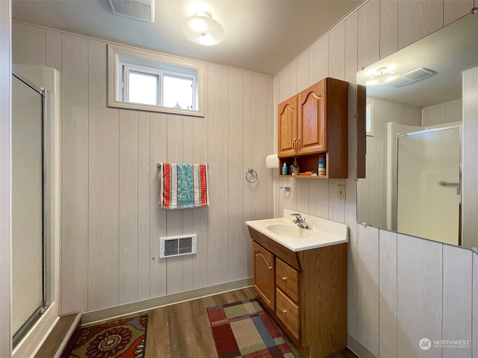 61 Sunny Dell Lane Sequim, WA 98382 - Photo 36 of 40 a bathroom with a sink and a mirror