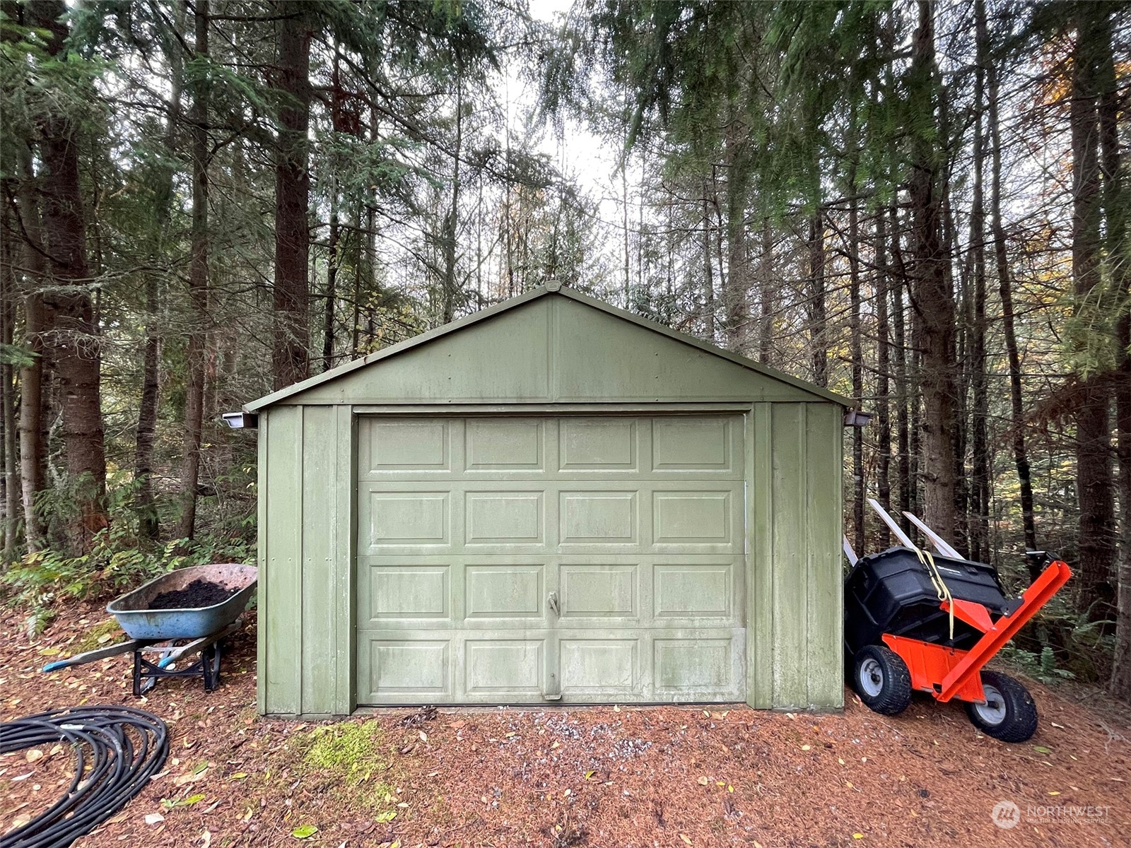 61 Sunny Dell Lane Sequim, WA 98382 - Photo 39 of 40 a backyard of a house with barbeque oven