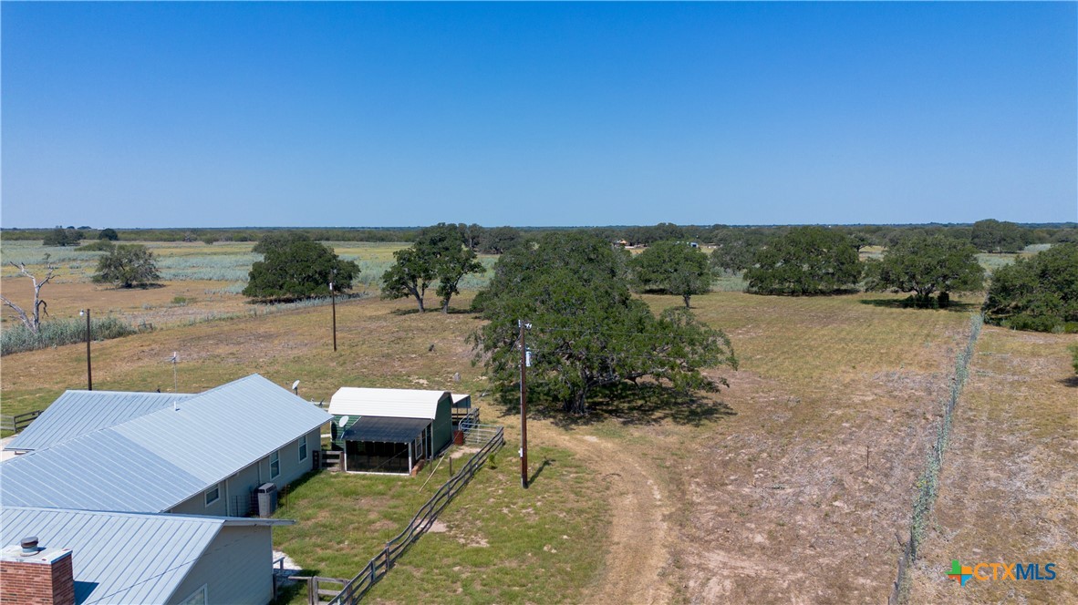 3752 Farm To Market 77 Nixon, TX 78140 - Photo 11 of 48 a view of a terrace with a bench