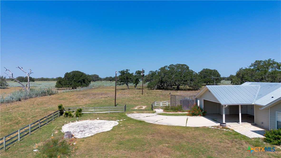 3752 Farm To Market 77 Nixon, TX 78140 - Photo 12 of 48 a view of a swimming pool with a patio