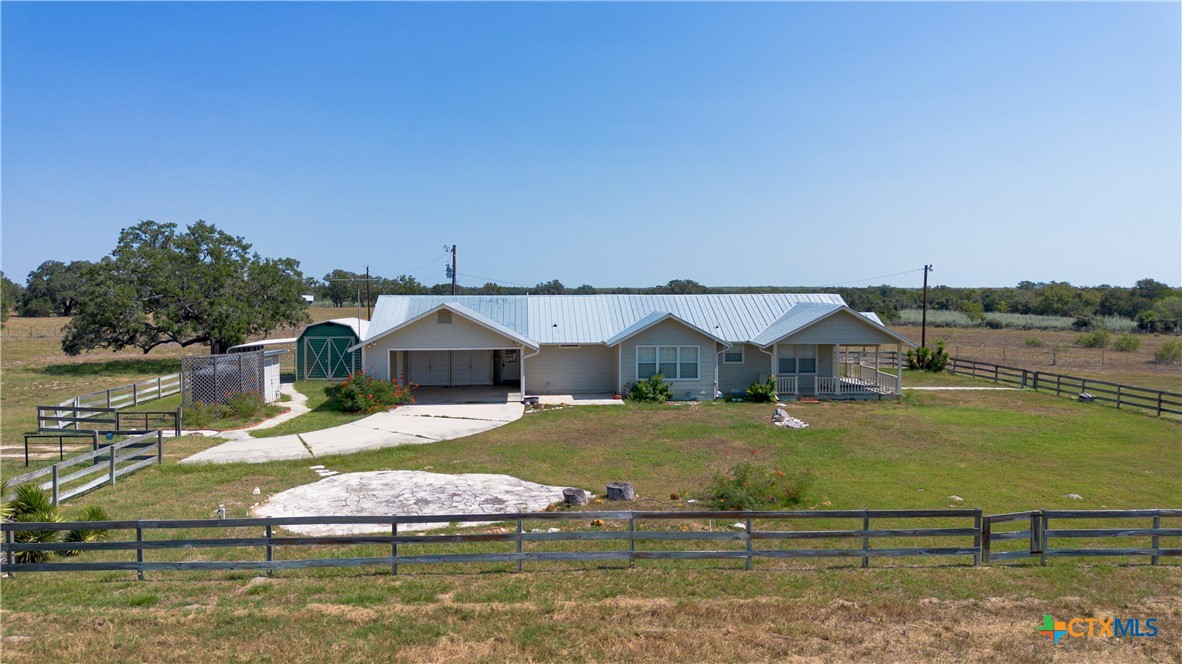 3752 Farm To Market 77 Nixon, TX 78140 - Photo 17 of 48 a view of a house with yard and lake view