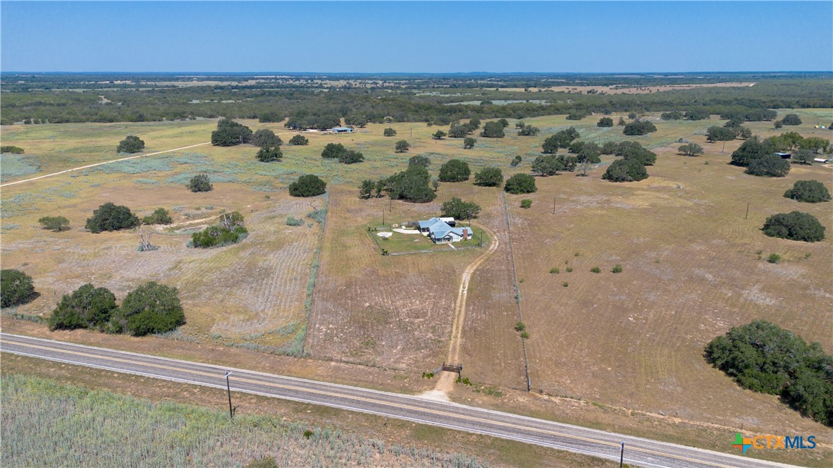 3752 Farm To Market 77 Nixon, TX 78140 - Photo 2 of 48 an aerial view of a house with a ocean view