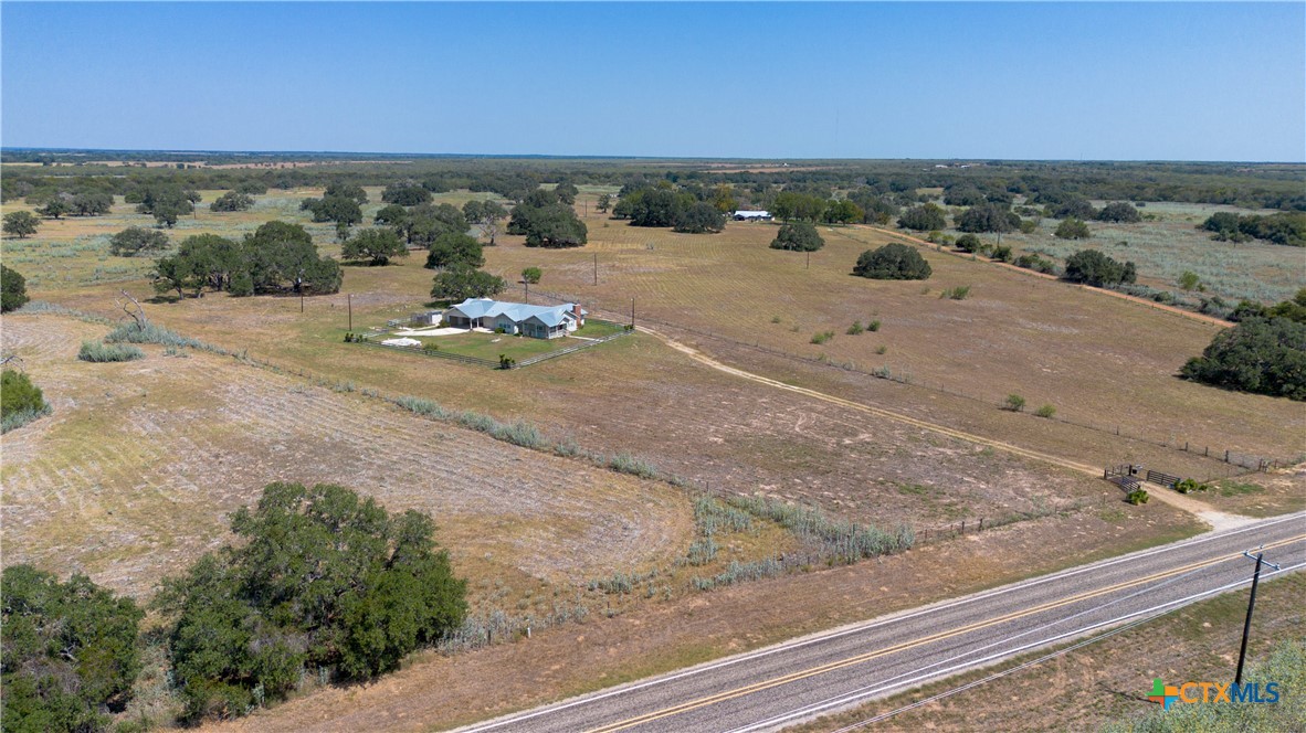 3752 Farm To Market 77 Nixon, TX 78140 - Photo 5 of 48 an aerial view of a beach with a yard