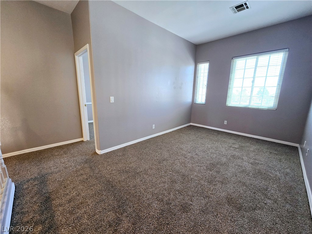 3759 Funston Way Las Vegas, NV 89129 - Photo 15 of 31 Plush carpeting and well-placed windows create a comfortable and private retreat.