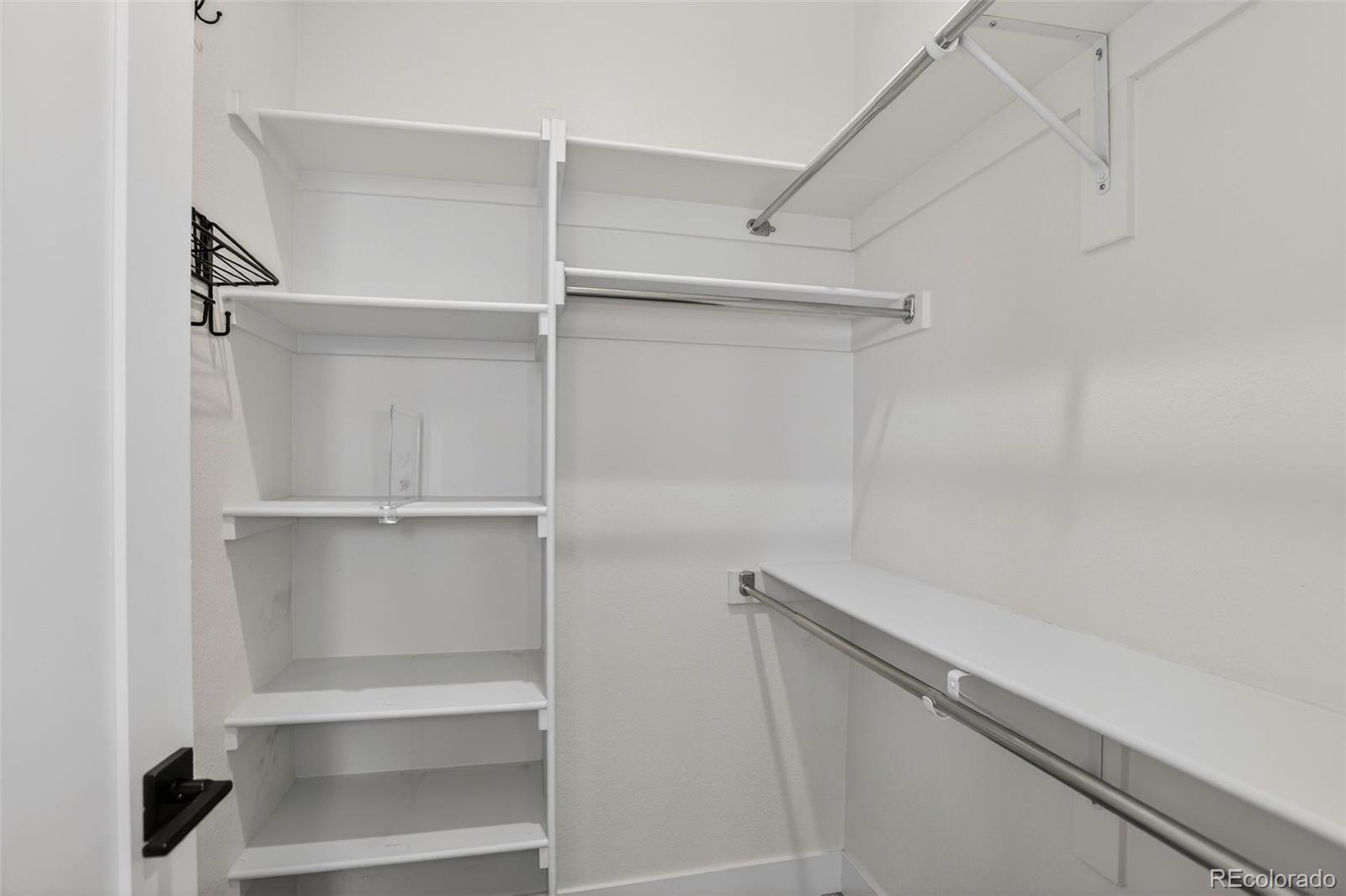 1234 Perry Street Denver, CO 80204 - Photo 17 of 29 a view of an empty walk in closet