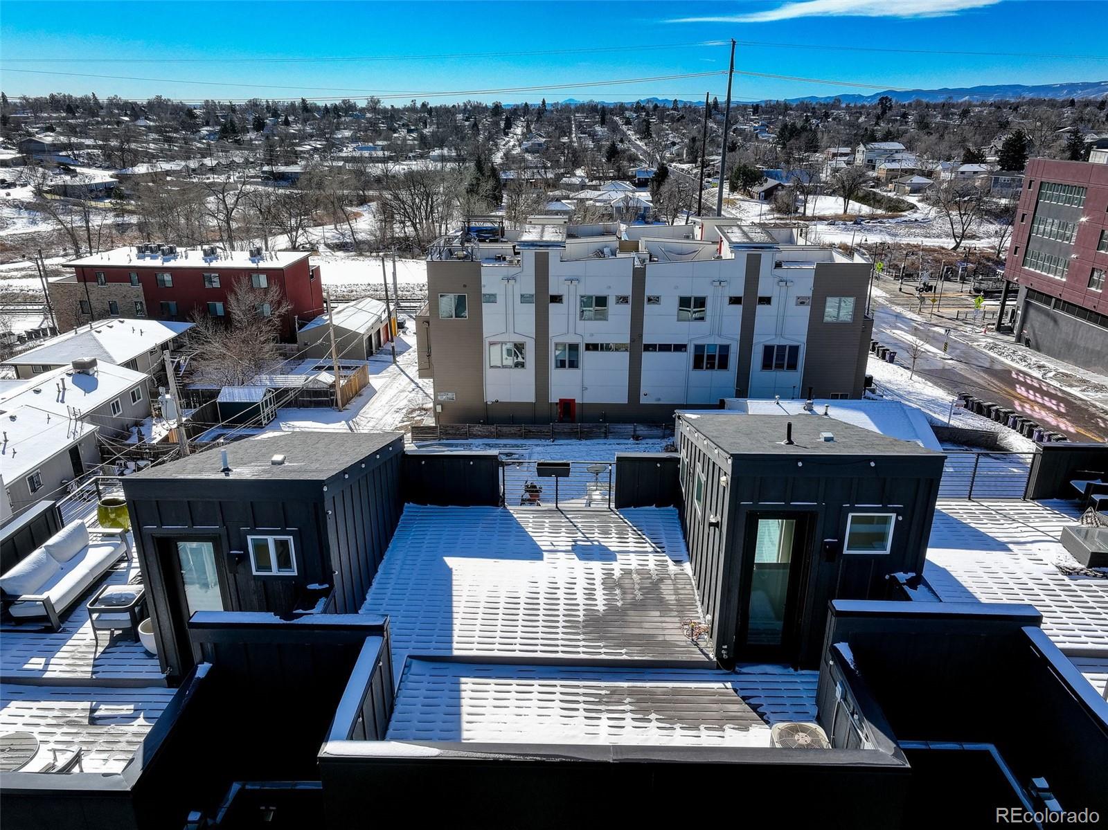 1234 Perry Street Denver, CO 80204 - Photo 23 of 29 a picture of a table and chairs in the terrace