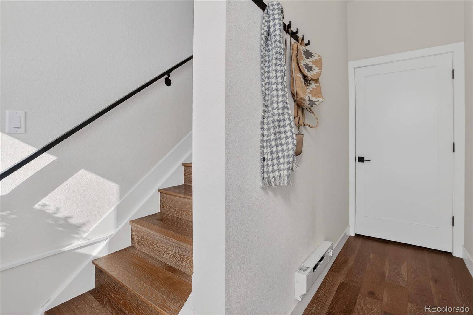1234 Perry Street Denver, CO 80204 - Photo 5 of 29 a view of an entryway with wooden floor