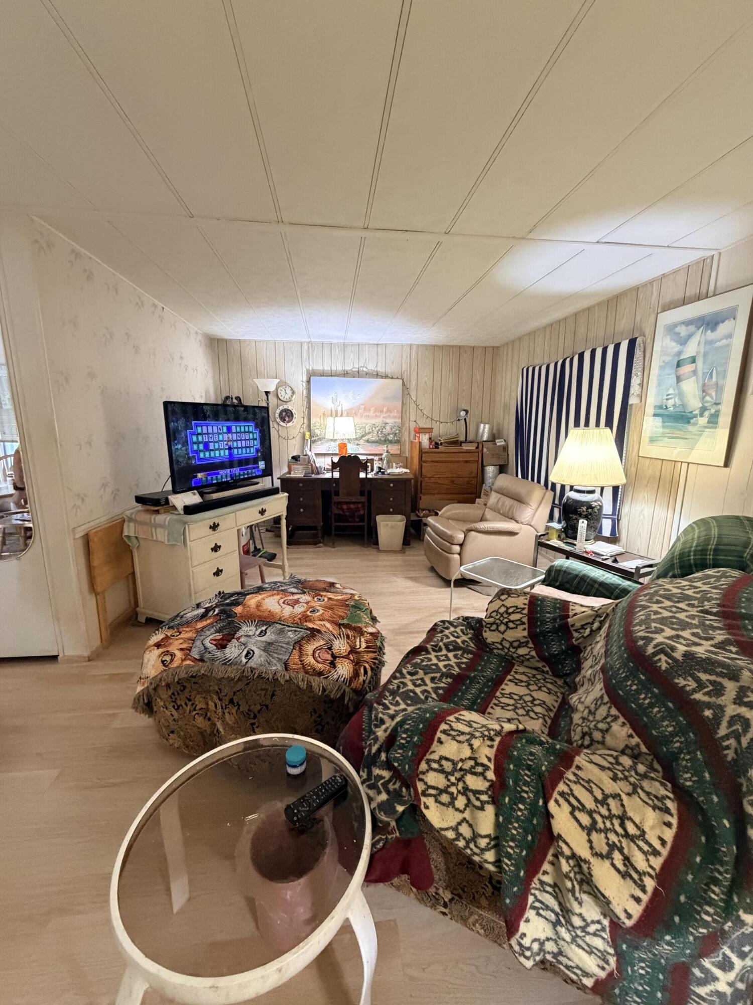 288 Turf Paradise Street Rancho Mirage, CA 92270 - Photo 11 of 18 a living room with furniture and a window