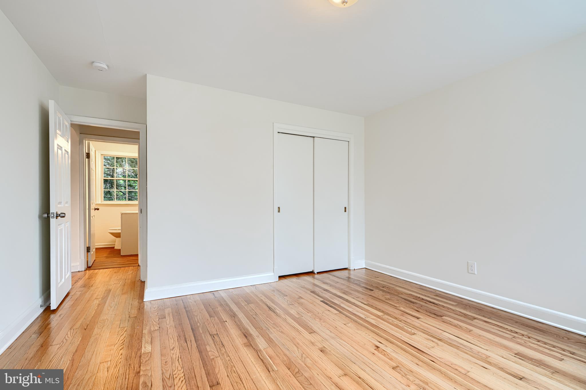 1813 Weyburn Road Baltimore, MD 21237 - Photo 19 of 39 a view of a room with wooden floor and a bathroom