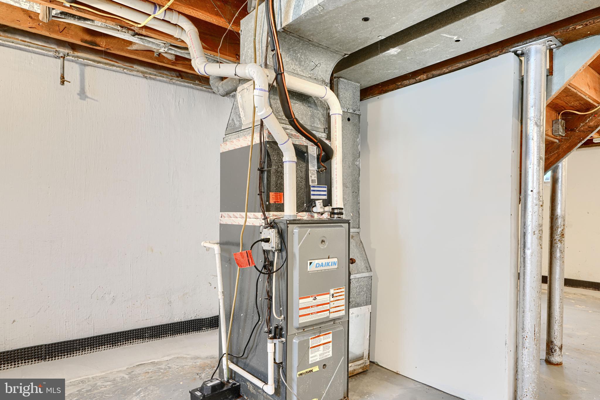 1813 Weyburn Road Baltimore, MD 21237 - Photo 32 of 39 a view of a hallway with windows