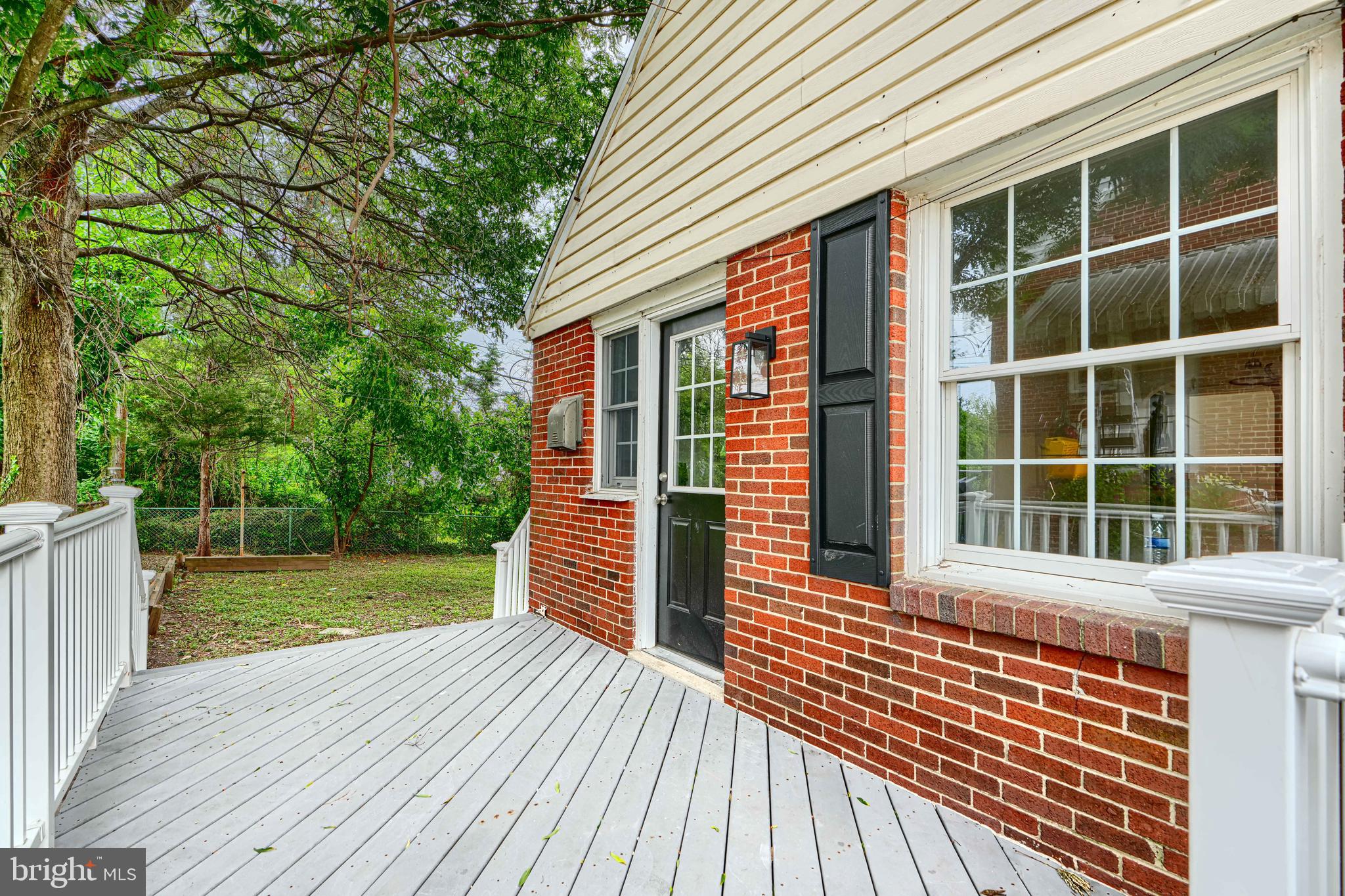 1813 Weyburn Road Baltimore, MD 21237 - Photo 34 of 39 a view of outdoor space with deck and wooden floor