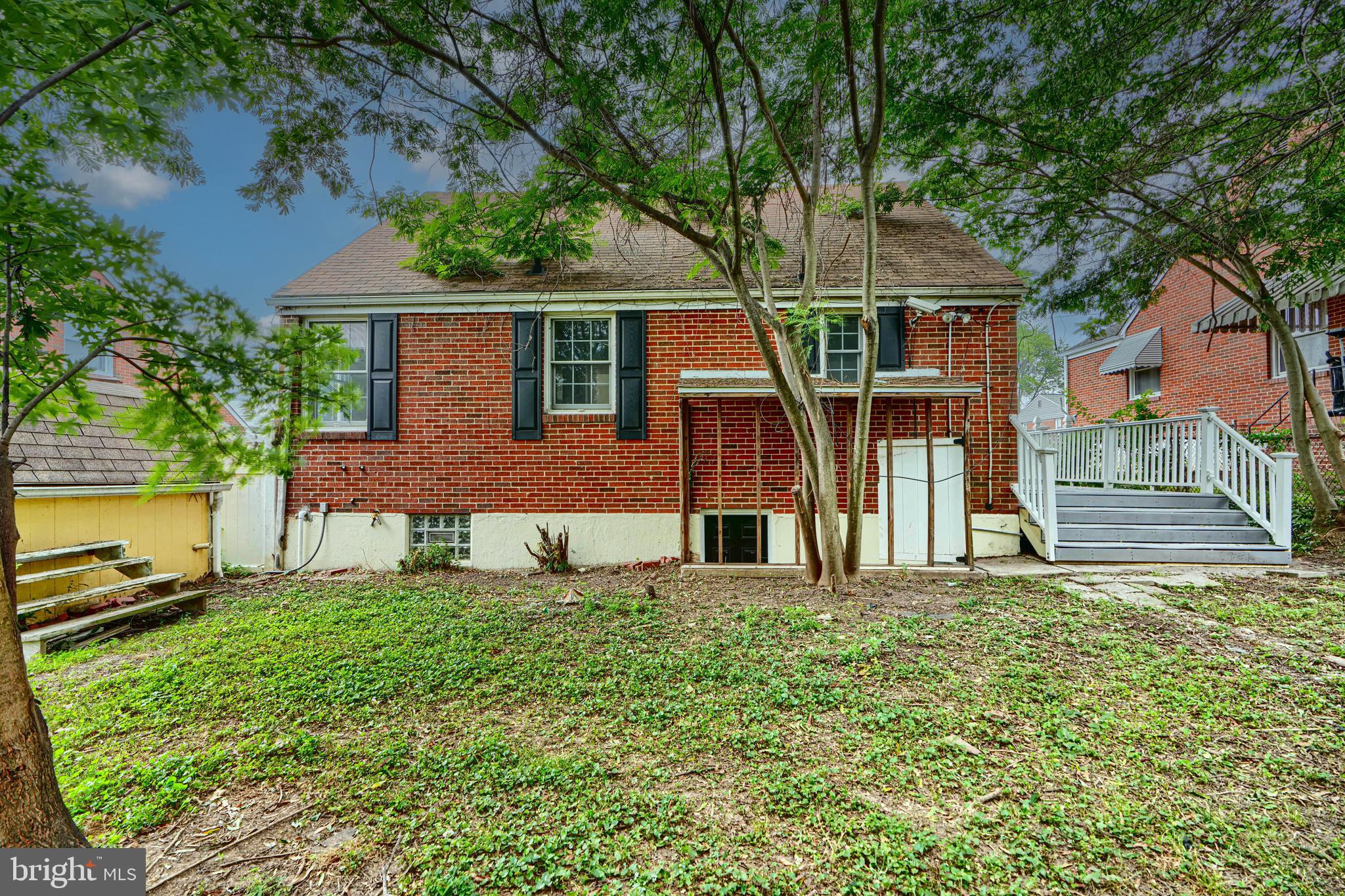 1813 Weyburn Road Baltimore, MD 21237 - Photo 36 of 39 a view of a house with a yard