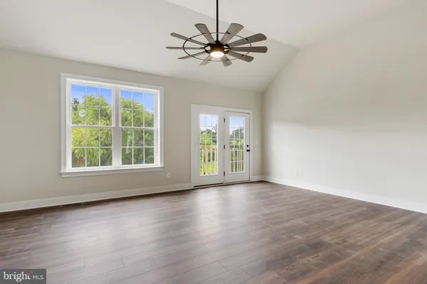 an empty room with windows
