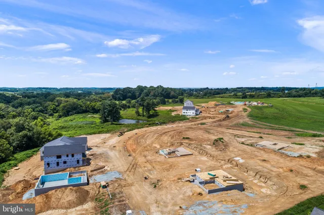 an aerial view of a house with outdoor space