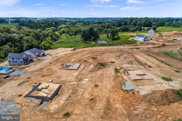 an aerial view of a house with a garden