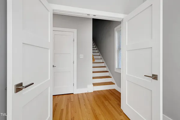 a kitchen with stainless steel appliances a refrigerator sink and microwave