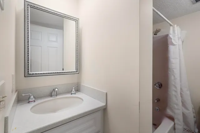 a view of house with outdoor space and tree s