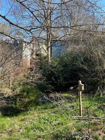a view of outdoor space with a yard