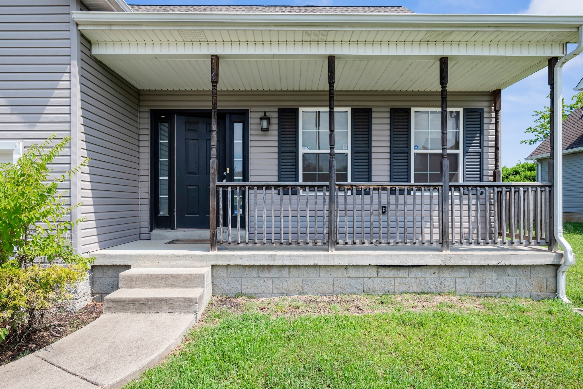 756 Maylene Drive Madison, TN 37115 - Photo 25 of 25 a view of a house with a small yard and plants