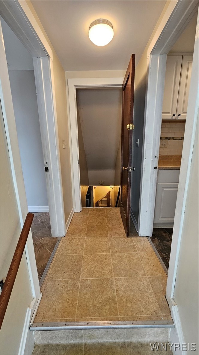 107 Fowler Avenue, Unit RIGHT Tonawanda, NY 14217 - Photo 17 of 24 Rear common hallway to both apartments and basement