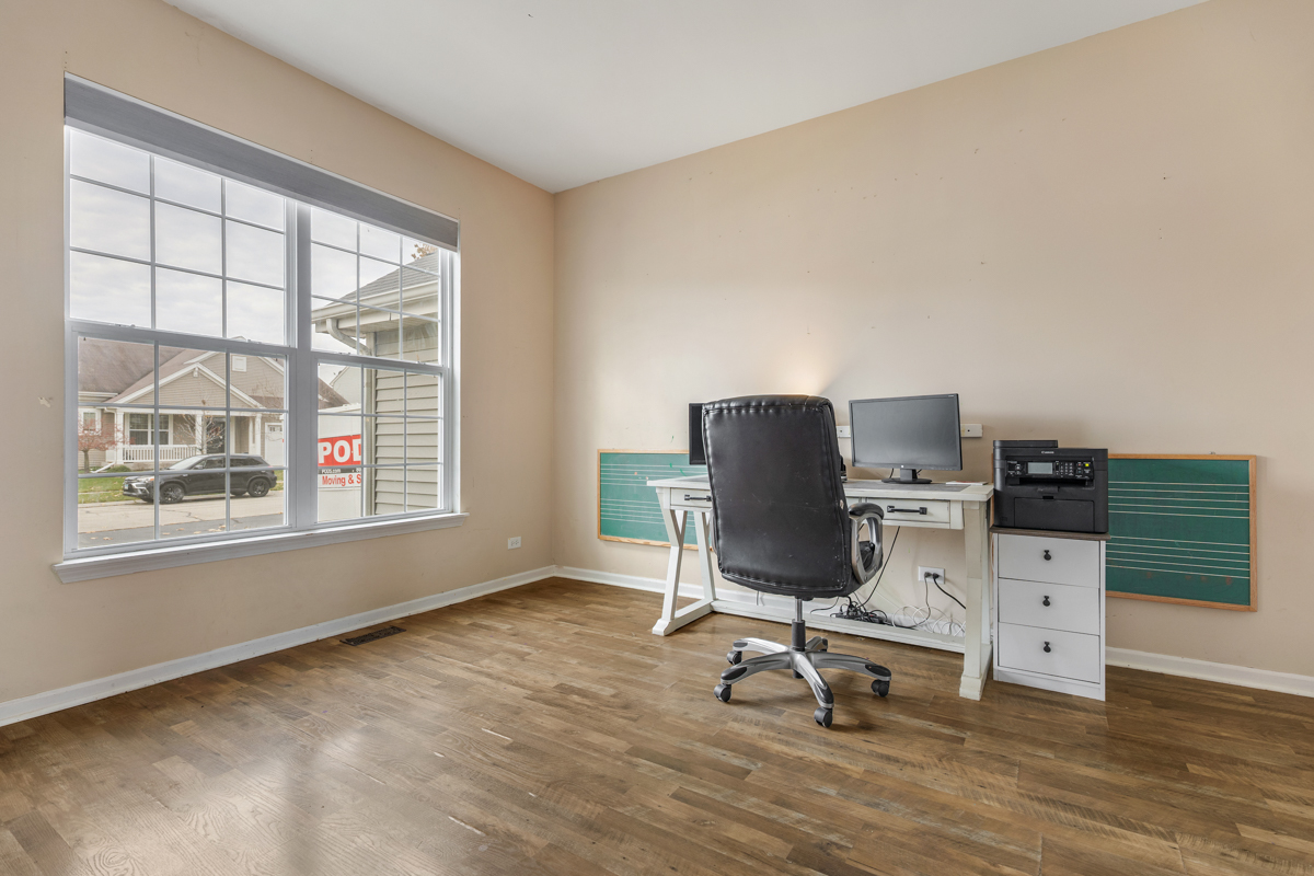1157 Clearwater Drive Pingree Grove, IL 60140 - Photo 15 of 34 a workspace with furniture and a window