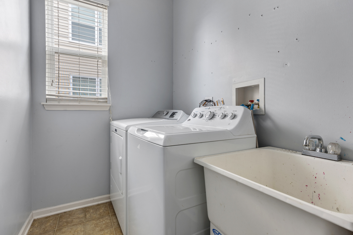 1157 Clearwater Drive Pingree Grove, IL 60140 - Photo 22 of 34 a utility room with dryer and washer
