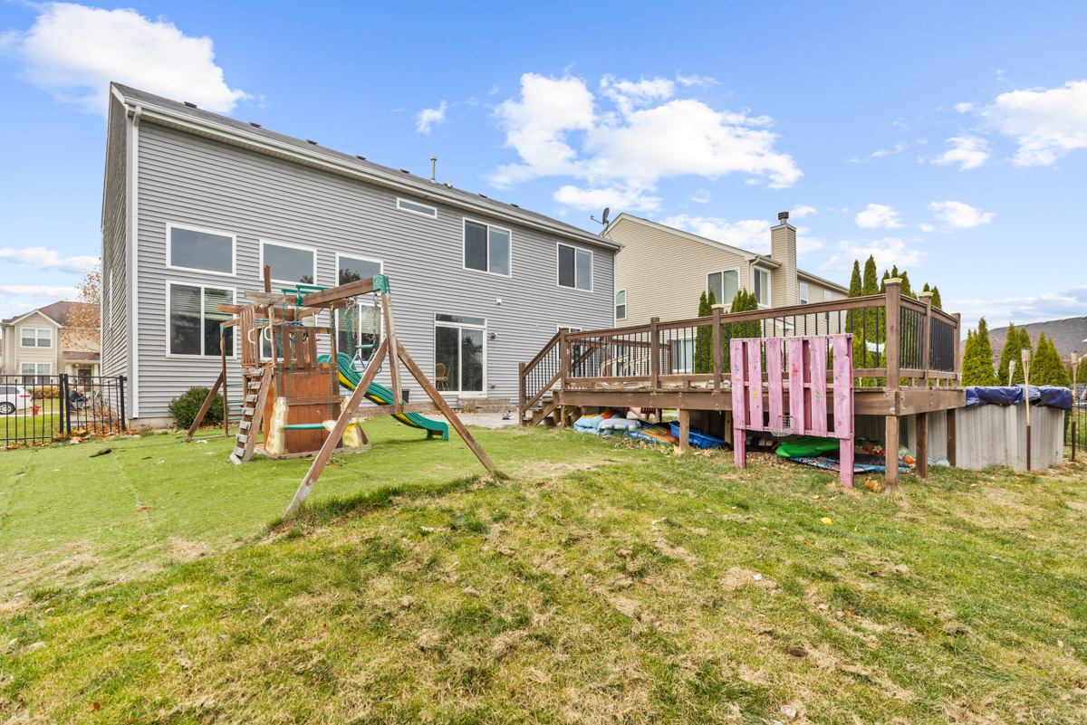1157 Clearwater Drive Pingree Grove, IL 60140 - Photo 27 of 34 a view of a house with swimming pool and sitting area