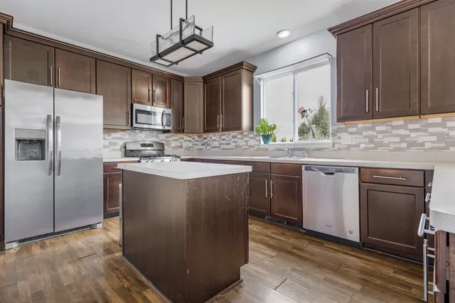 a backyard of a house with seating space