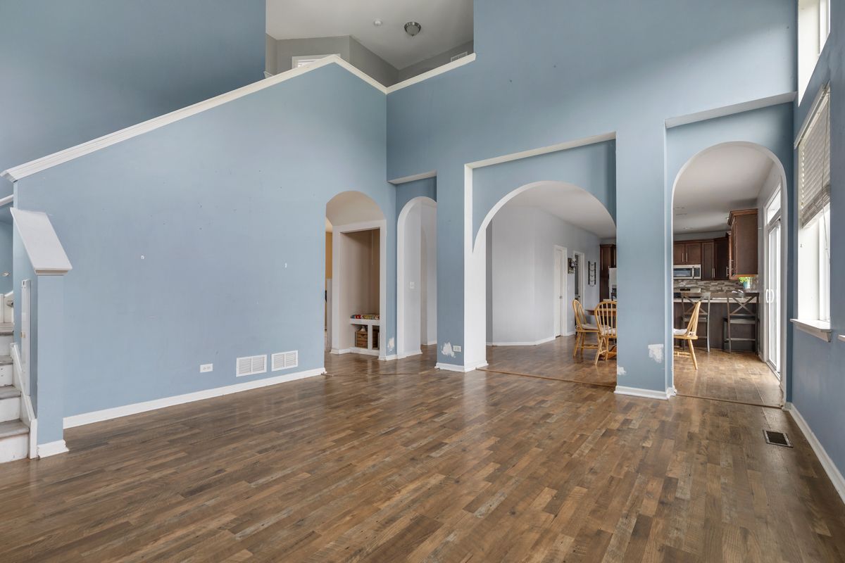 1157 Clearwater Drive Pingree Grove, IL 60140 - Photo 5 of 34 a view of an entryway with wooden floor