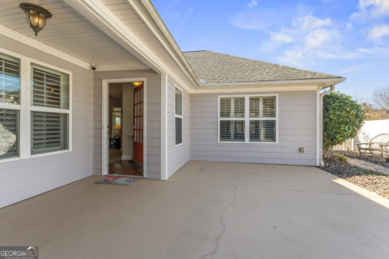 100 Cottage Club Drive Locust Grove, GA 30248 - Photo 28 of 42 a view of a house with a large windows