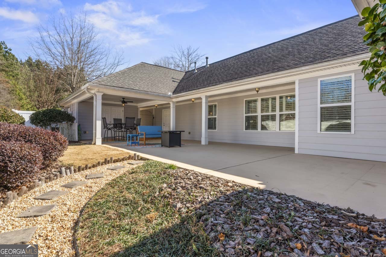 100 Cottage Club Drive Locust Grove, GA 30248 - Photo 30 of 42 a view of a house with a outdoor space