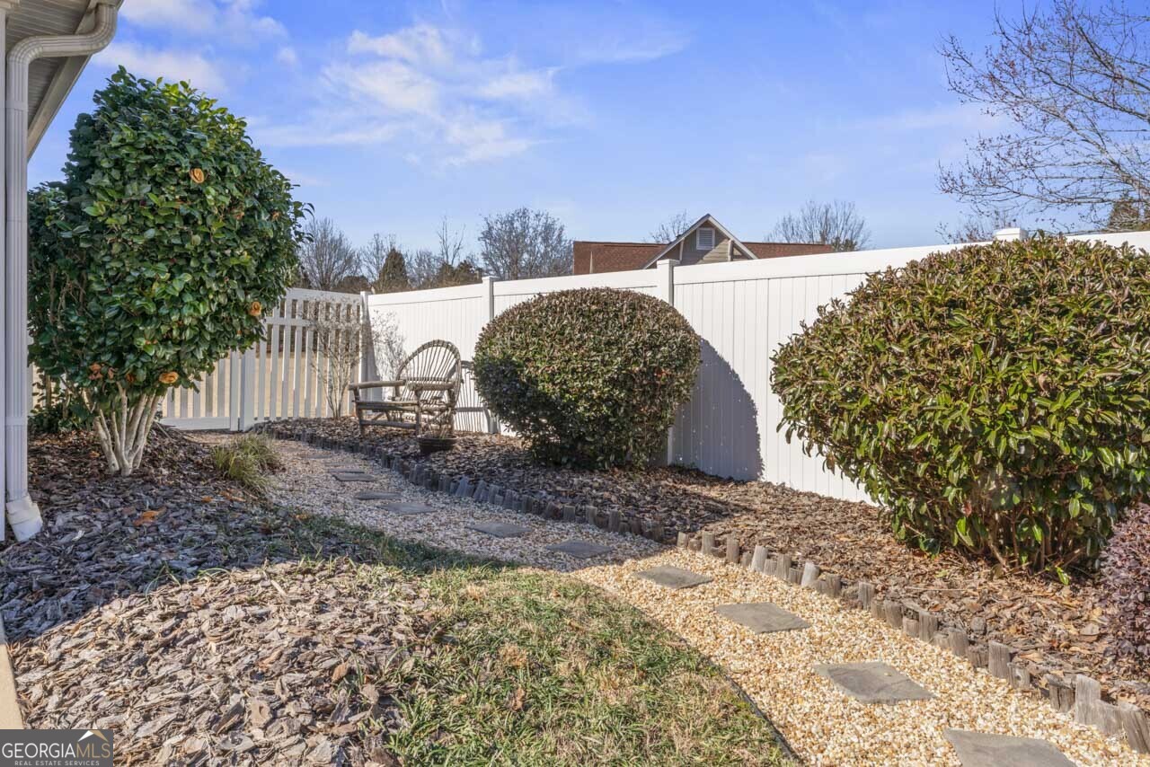 100 Cottage Club Drive Locust Grove, GA 30248 - Photo 31 of 42 a view of a backyard