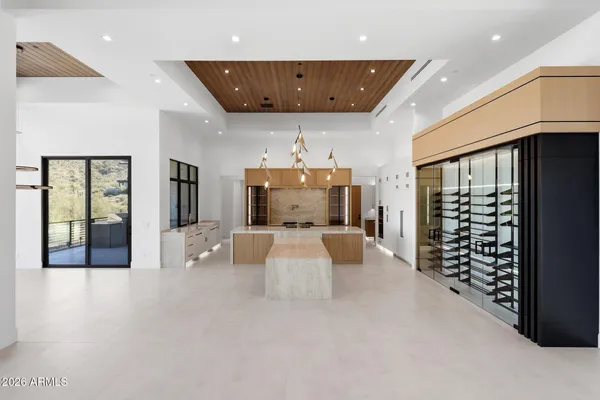 a view of an empty room with glass door