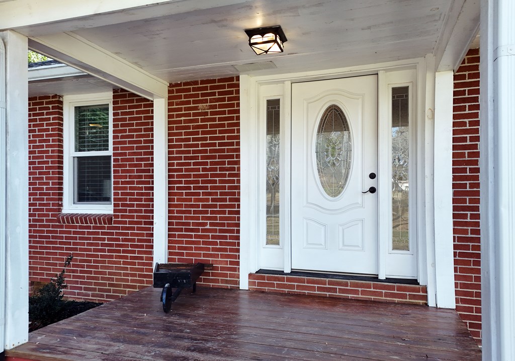 16894 Morganton Highway Morganton, GA 30560 - Photo 12 of 51 a front view of a house with garden