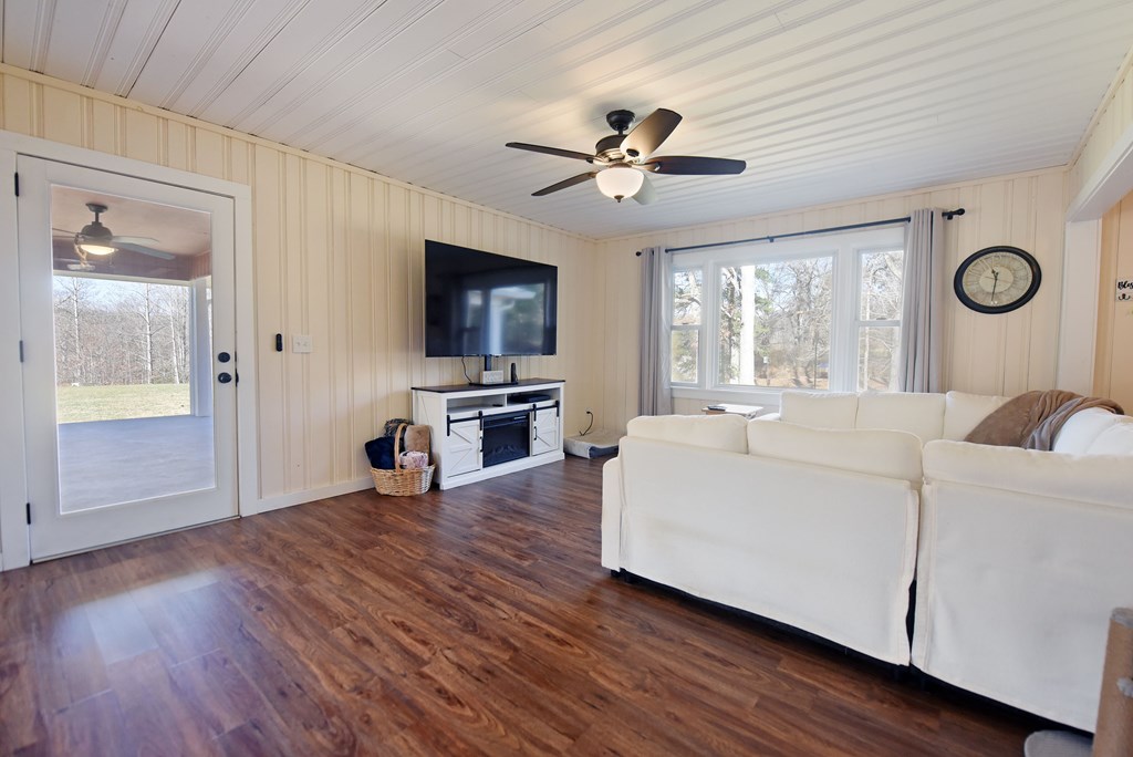 16894 Morganton Highway Morganton, GA 30560 - Photo 19 of 51 a living room with furniture and a flat screen tv