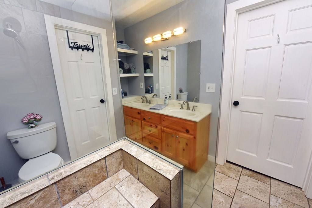 16894 Morganton Highway Morganton, GA 30560 - Photo 27 of 51 a bathroom with a sink toilet and shower