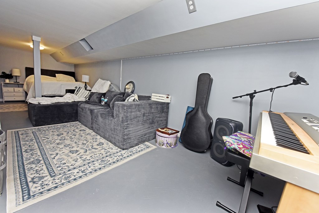 16894 Morganton Highway Morganton, GA 30560 - Photo 31 of 51 a living room with furniture a rug