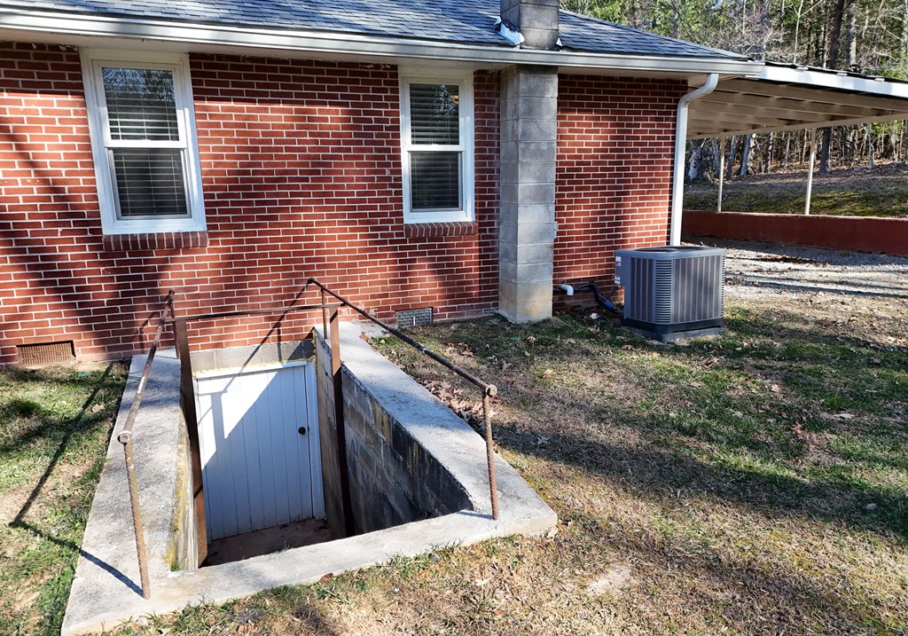 16894 Morganton Highway Morganton, GA 30560 - Photo 35 of 51 a view of a house with a yard and sitting area