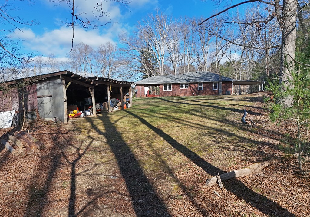 16894 Morganton Highway Morganton, GA 30560 - Photo 36 of 51 a view of a yard with an outdoor space