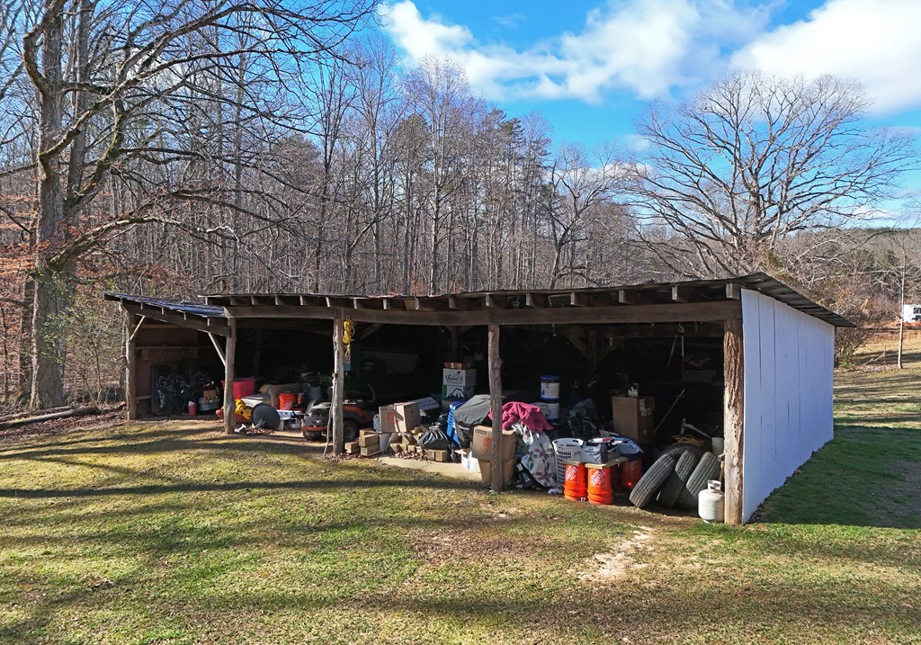 16894 Morganton Highway Morganton, GA 30560 - Photo 37 of 51 a view of a chairs and tables in patio