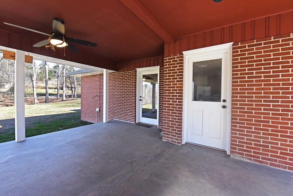 16894 Morganton Highway Morganton, GA 30560 - Photo 38 of 51 a view of a porch with wooden floor and fence