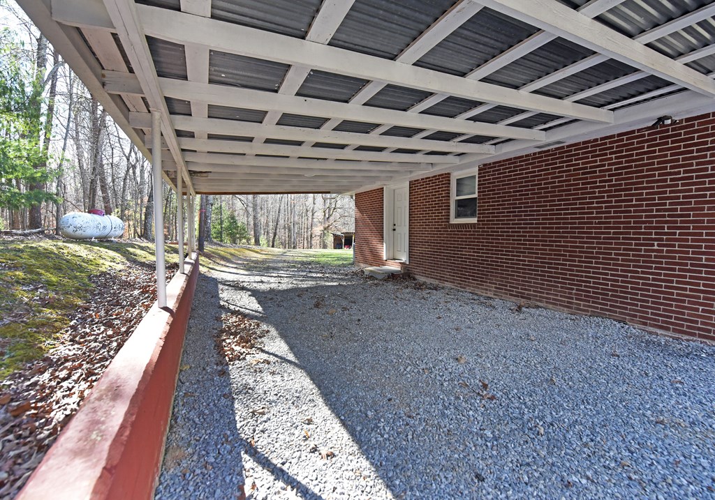 16894 Morganton Highway Morganton, GA 30560 - Photo 40 of 51 a view of an empty room with wooden floor