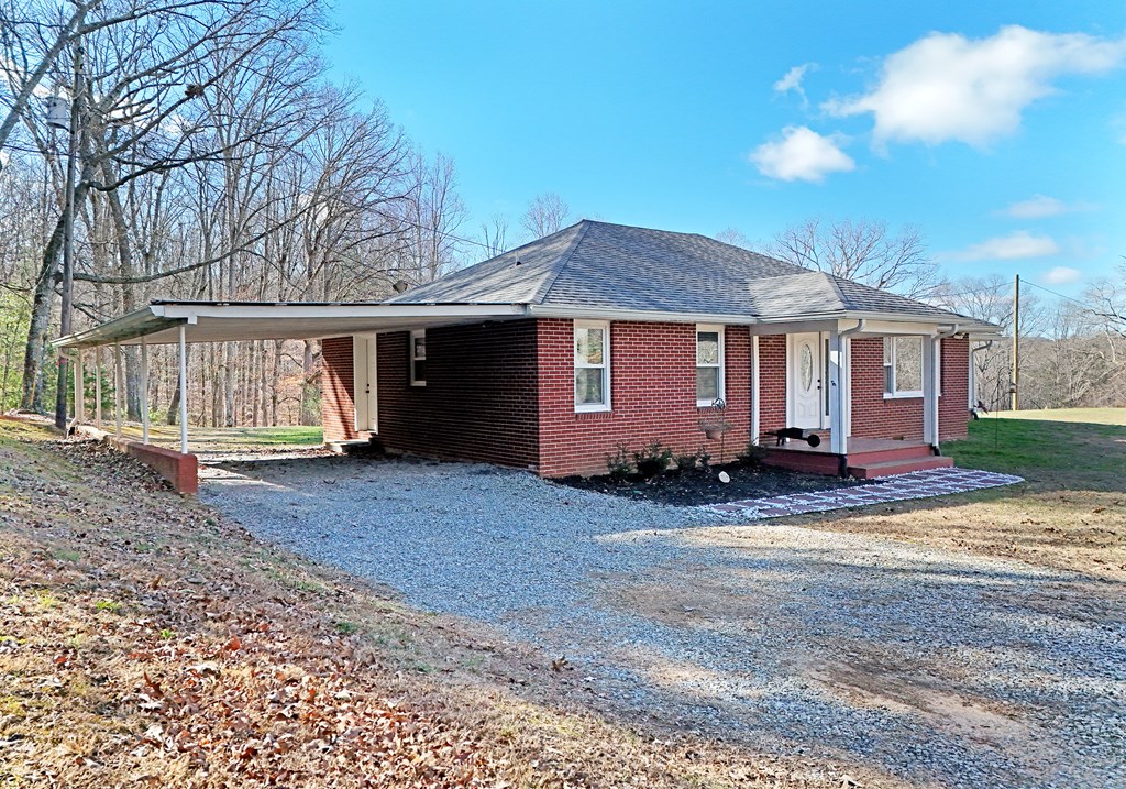 16894 Morganton Highway Morganton, GA 30560 - Photo 41 of 51 a view of a house with a yard