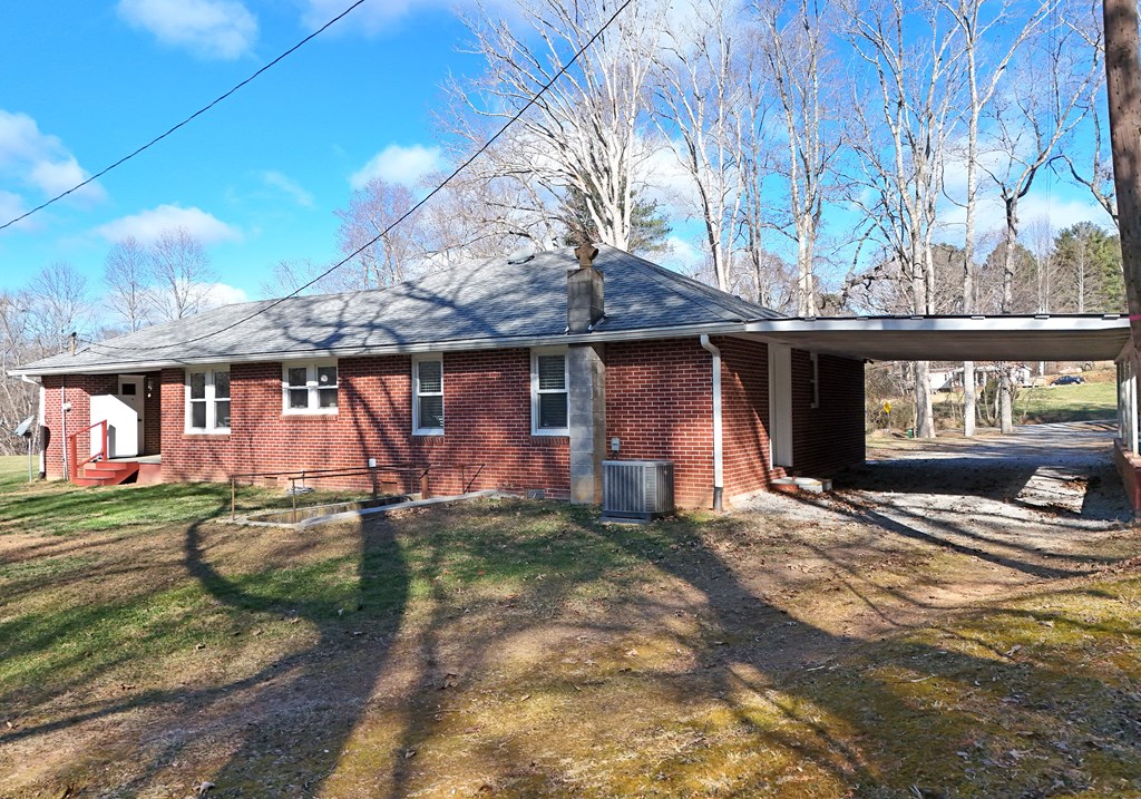 16894 Morganton Highway Morganton, GA 30560 - Photo 43 of 51 a front view of a house with a yard