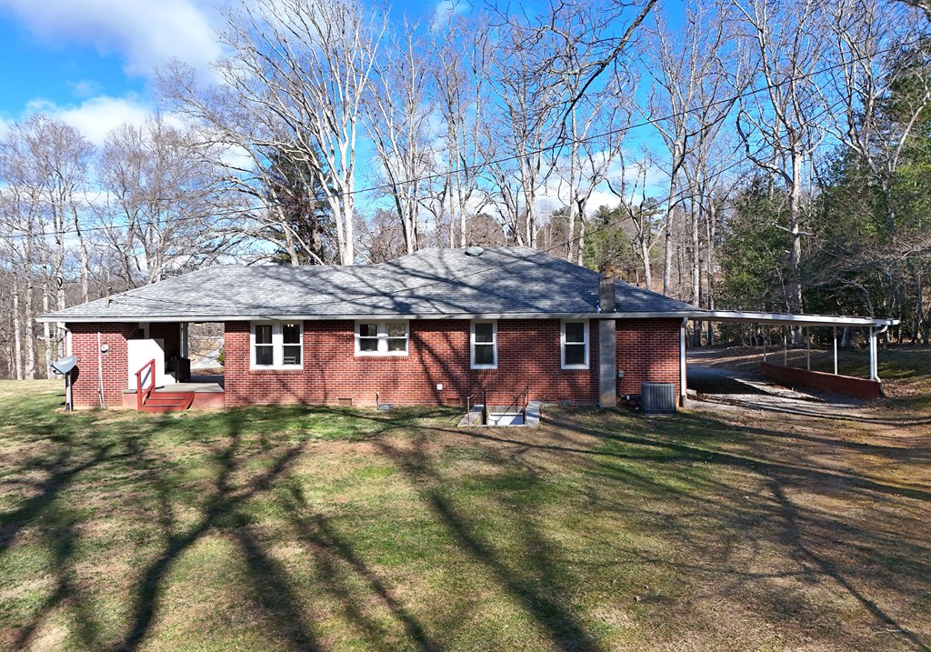 16894 Morganton Highway Morganton, GA 30560 - Photo 49 of 51 a view of a house with large yard and large tree