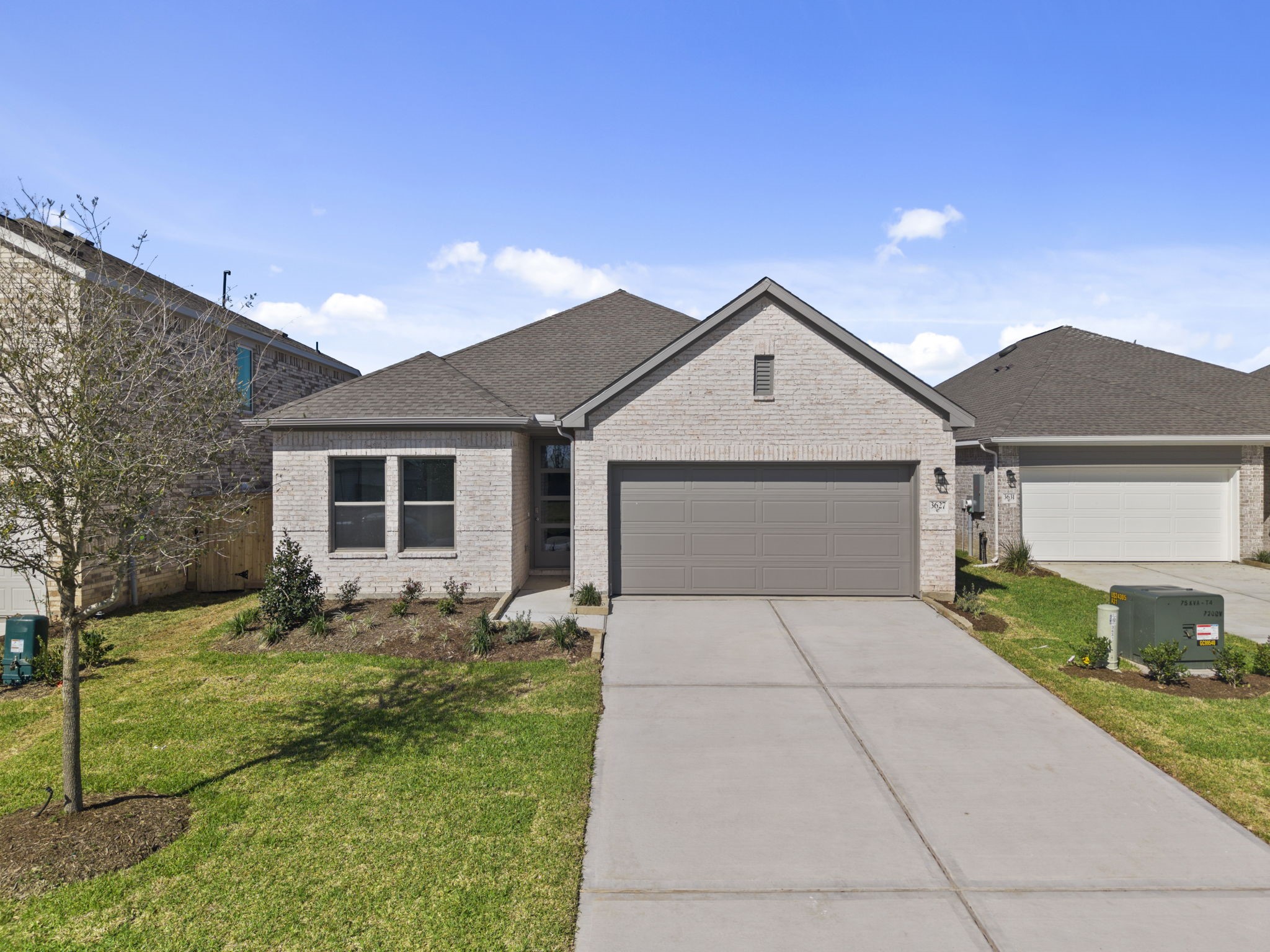 3627 Atlas Pt Lane Angleton, TX 77515 - Photo 26 of 36 a front view of house with yard and trees in the background