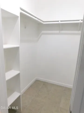 a empty closet with white paint