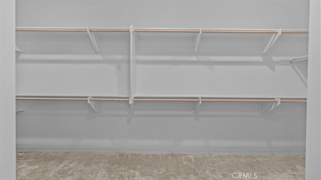 7044 Mallow Drive Mall, Unit 4 Fontana, CA 92336 - Photo 12 of 19 a view of an empty walk in closet