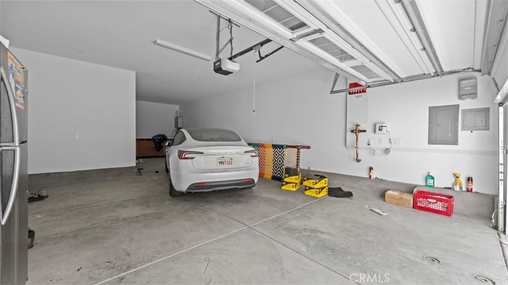 7044 Mallow Drive Mall, Unit 4 Fontana, CA 92336 - Photo 17 of 19 a utility room with furniture and toys