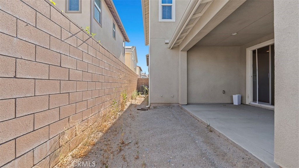 7044 Mallow Drive Mall, Unit 4 Fontana, CA 92336 - Photo 18 of 19 a view of an empty room with stairs